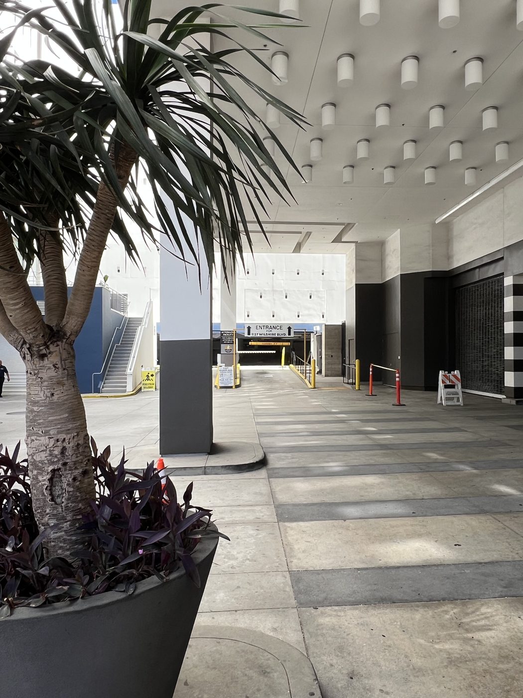 The self-parking entrance past the valet area at 1127 Wilshire Boulevard