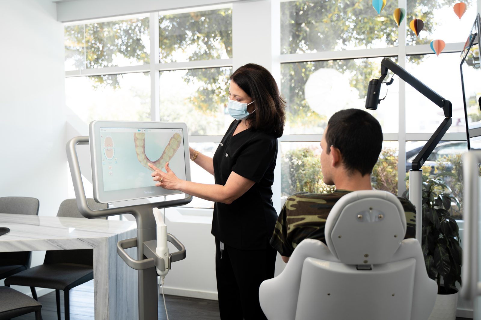 An adult patient at the chair
